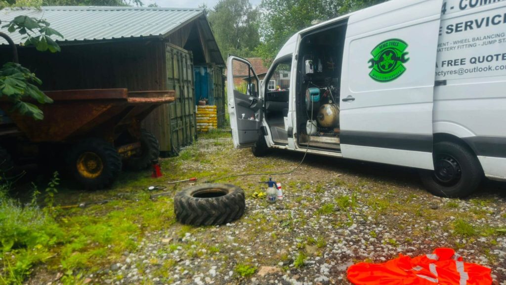 MMC Tyres mobile fitting van performing a dumper tyre repair in Alverchurch.